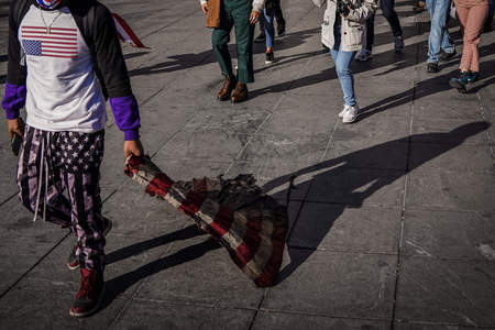 Demonstrators enter Washington Square Park in New York, N.Y. on March 20, 2021 to join a Stop Asian Hate vigil in response to a series of shootings in Atlanta, Ga. that killed eight people, including six Asian women.