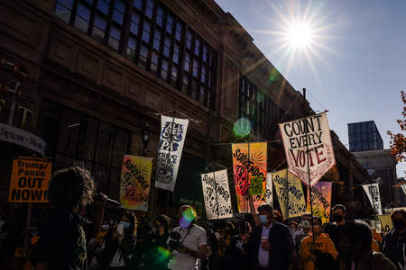 Local activist Samantha Rise speaks to demonstrators during a Count Every Vote protest outside the Pennsylvania Convention Center in Philadelphia, Pa. on Nov. 6, 2020.