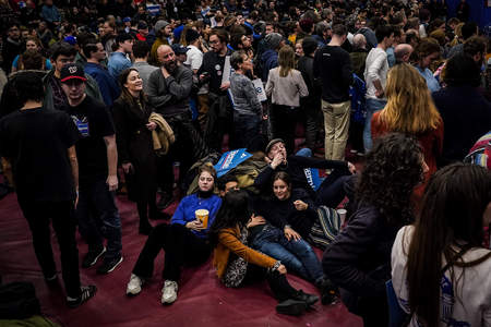 Supporters wait for Sen. Bernie Sanders (I-Vt.) to speak at a primary night event during the New Hampshire Democratic primary election in Manchester, N.H. on Feb. 11, 2020.