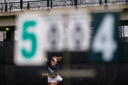 The University of Pennsylvanias Iuliia Bryzgalova hits a serve during a singles match against Temple University at Hamlin Tennis Center in Philadelphia, Pa. on April 14, 2021.