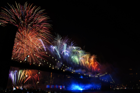 Fireworks explode over the Brooklyn Bridge during the Macy's Fourth of July fireworks show in New York, N.Y. on July 4, 2019.