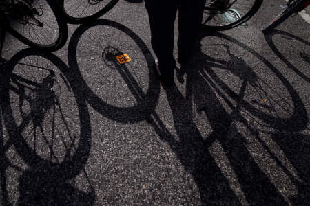 A line of police bikes separates a Count Every Vote demonstration from a group of Trump supporters outside the Pennsylvania Convention Center in Philadelphia, Pa. on Nov. 6, 2020.