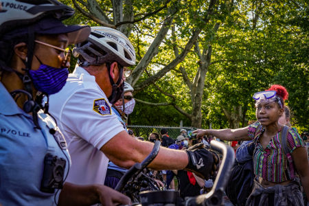 A protester speaks to Philadelphia Police officers on the Benjamin Franklin Parkway in Philadelphia, Pa. on June 1, 2020.