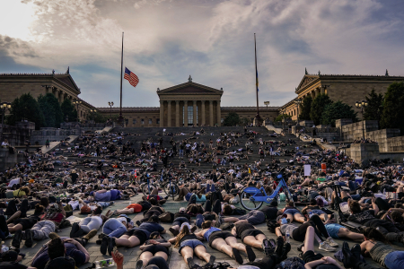 Protesters lie down in silence for eight minutes and 46 seconds in front of the Philadelphia Museum of Art on June 4, 2020.