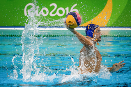 Mladan Janovic of Montenegro attempts a shot during the men's water polo quarterfinal match against Hungary in Rio de Janeiro, Brazil on Aug. 16, 2016.