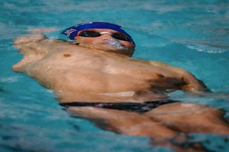 Sean Lee of the University of Pennsylvania competes in a backstroke event during a meet against Westchester University at Sheerr Pool in Philadelphia, Pa. on Feb. 1, 2020.