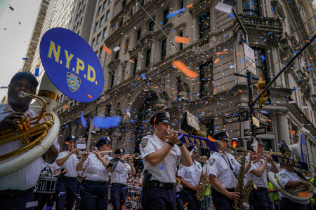 The New York Police Department band plays during a Hometown Heroes ticker tape parade through the Canyon of Heroes in New York, N.Y. on July 7, 2021.
