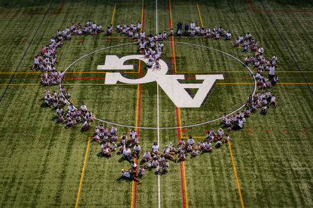 The campers and staff members form a heart on the final day of camp to celebrate a successful and virus-free summer on Aug. 21, 2020.