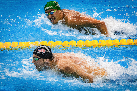 Chad le Clos of South Africa looks at Michael Phelps of the United States as Phelps wins gold in the men's 200m butterfly final at the Olympic Aquatics Stadium in Rio de Janerio, Brazil on Aug. 9, 2016.